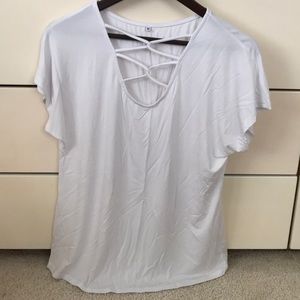NWOT white blouse cross cross design on front